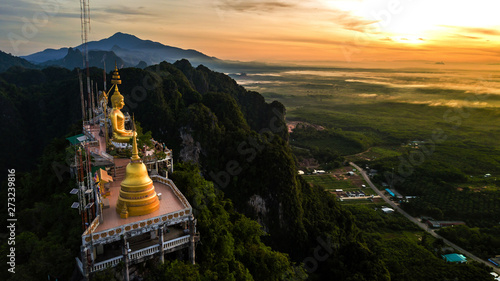Buddha on the top Mountain of Wat Tham Seua (Tiger Cae) , Krabi,Thailand