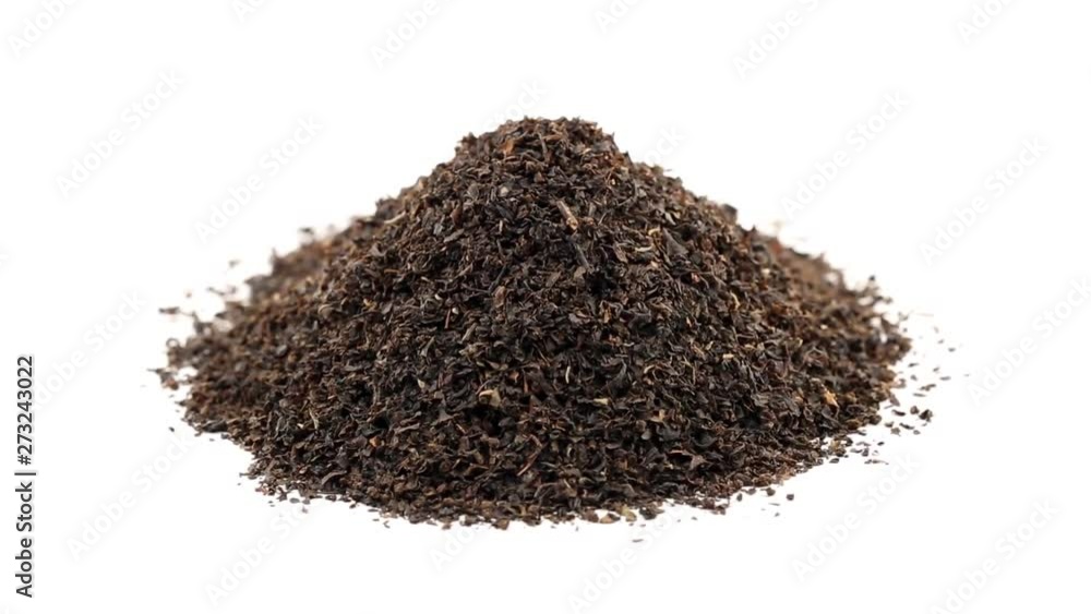 Dried black tea leaf crop rotating on white background Dried black tea leaf crop rotating on white background