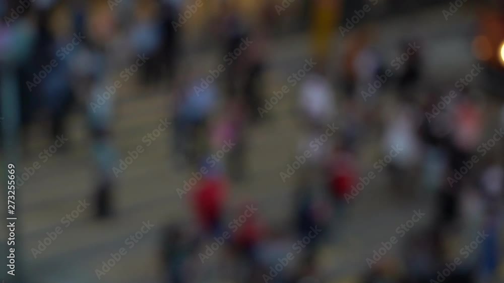Blurred people on busy crosswalk; Slow motion Blurred people on busy crosswalk; Slow motion