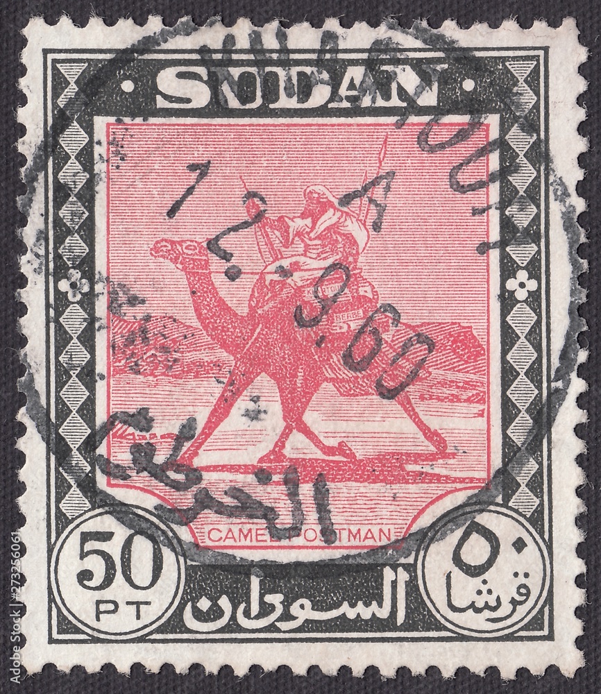 Obraz premium Dromedary (Camelus dromedarius).Carmine and black colors, stamp Sudan 1960