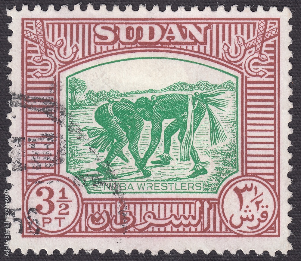 Obraz premium Nuba wrestlers.Martial arts,freestyle wrestling,sports, stamp Sudan 1951