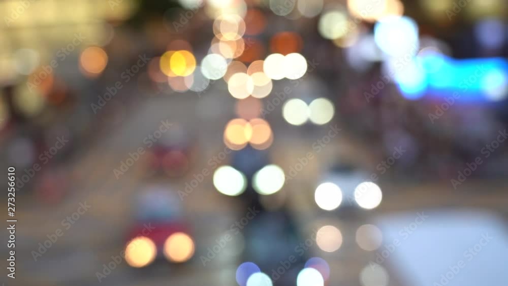 Hong Kong city night in blur; Bokeh view of Hong Kong Traffic at night; Slow Motion Hong Kong city night in blur; Bokeh view of Hong Kong Traffic at night; Slow Motion