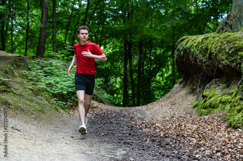 Healthy lifestyle - young man running © Jacek Chabraszewski