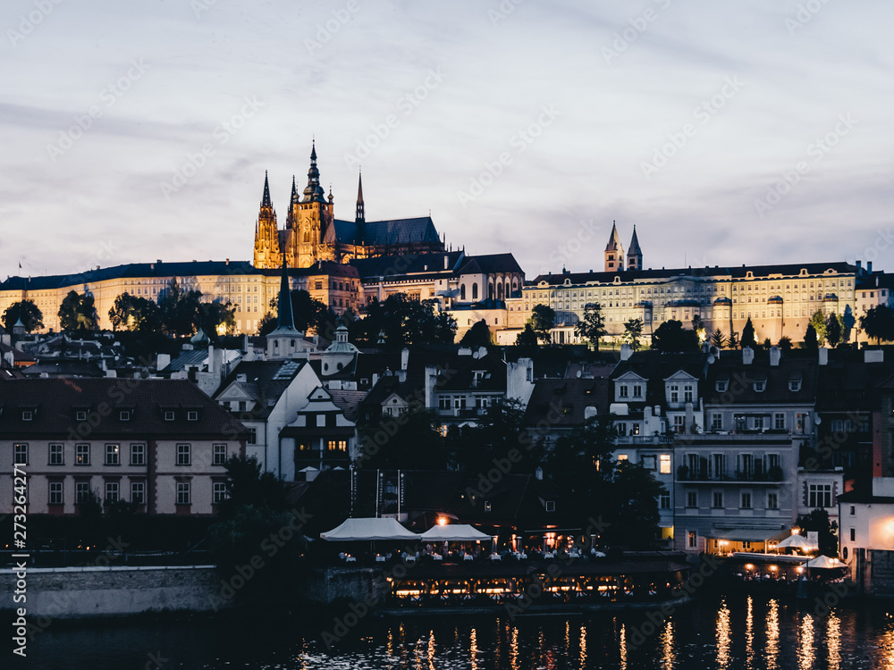 Prague Castle from Charles Bridge at dusk, night, evening, twilight Prague Castle from Charles Bridge at dusk, night, evening, twilight