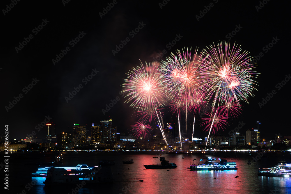 PATTAYA, THAILAND - MAY24: Beautiful lights on the night, colorful fireworks, and International fireworks at Pattaya International Fireworks Festival 2019 on May 24,2019 in Pattaya,Thailand.