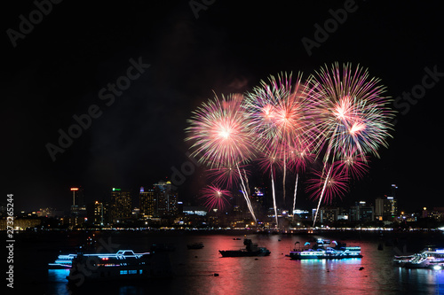 PATTAYA, THAILAND - MAY24: Beautiful lights on the night, colorful fireworks, and International fireworks at Pattaya International Fireworks Festival 2019 on May 24,2019 in Pattaya,Thailand. © Nattapol