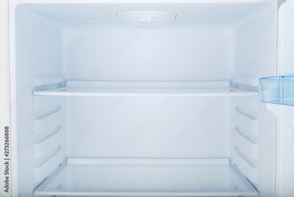 Fototapeta premium Refrigerator Isolated on White Background. Modern Kitchen and Domestic Major Appliances