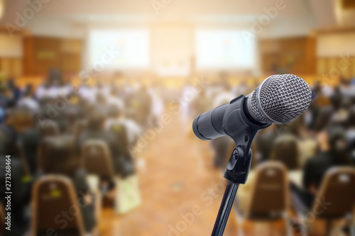 Microphone over the blurred business people forum Meeting Conference Training Learning Coaching Concept, Blurred background.