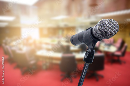 Microphone over the blurred business people forum Meeting Conference Training Learning Coaching Concept, Blurred background.