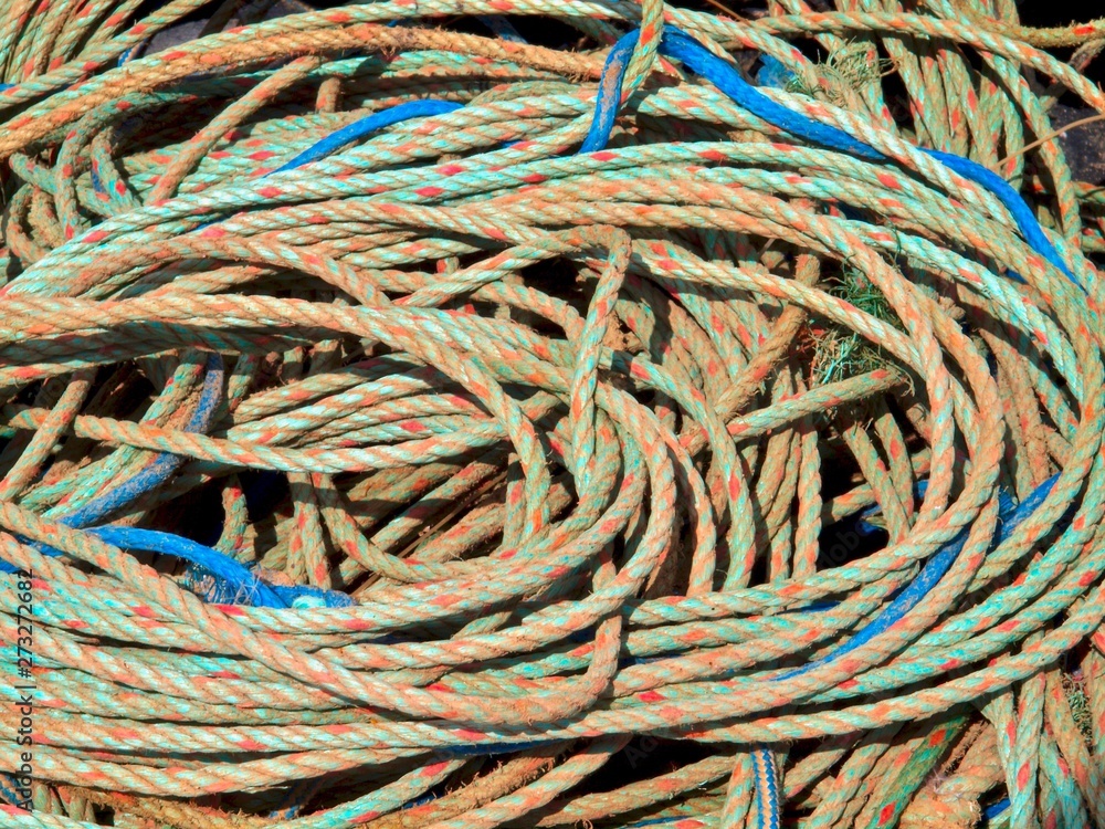 closeup of colorful fisher nets and fisher rope closeup of colorful fisher nets and fisher rope