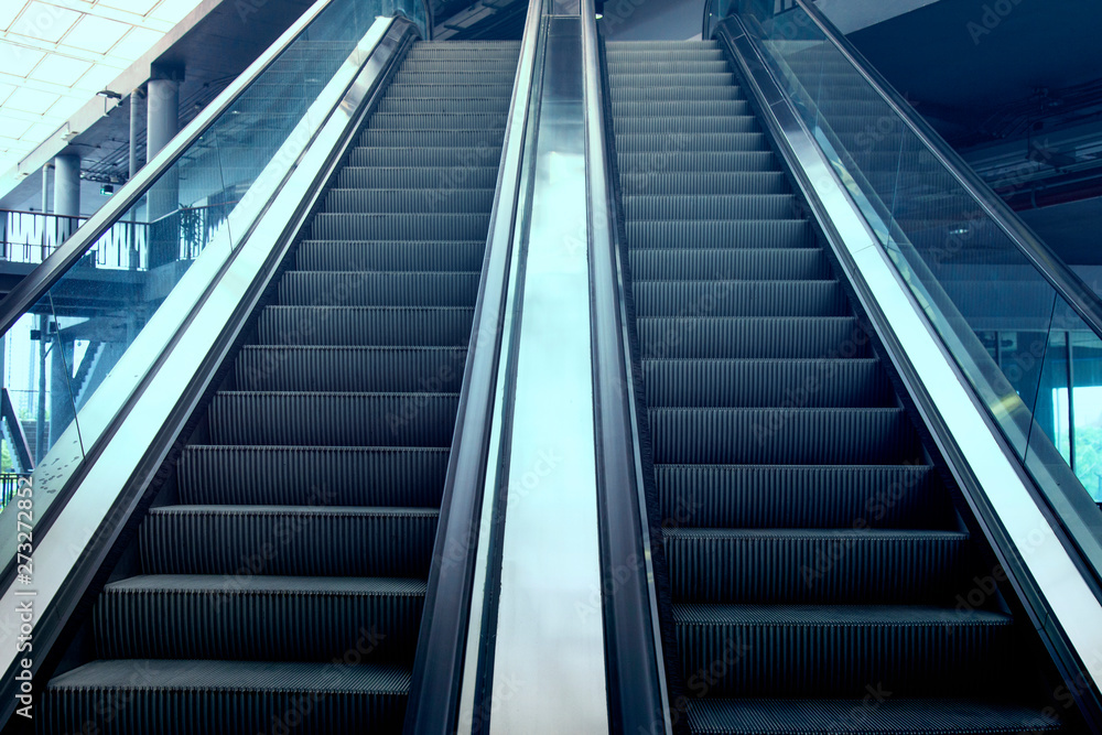 Empty Escalator in Office Building Empty Escalator in Office Building