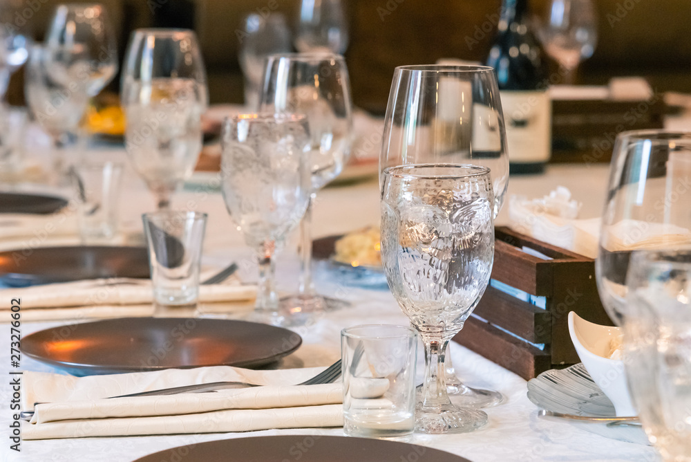 Tables in a cafe served for a holiday, birthday, wedding, banquet