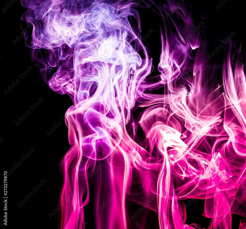 Obraz premium Colored smoke on black background