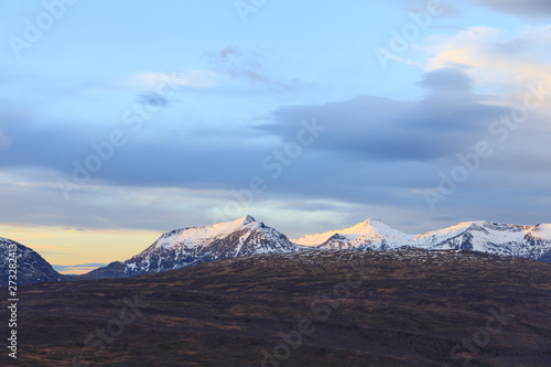 mountain summits at sunrise in norway in winter © Jochen Netzker