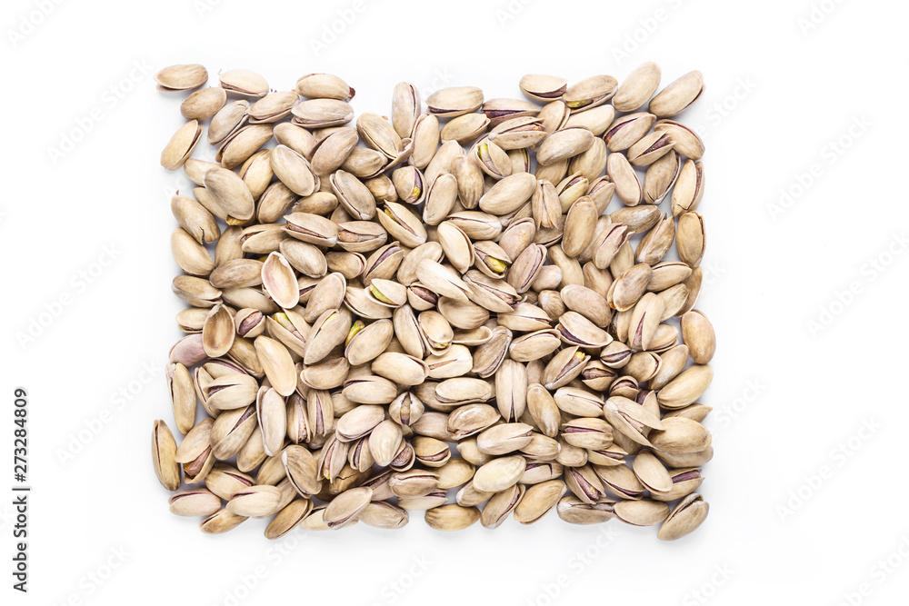 Pistachio nuts. Isolated on a white background Pistachio nuts. Isolated on a white background