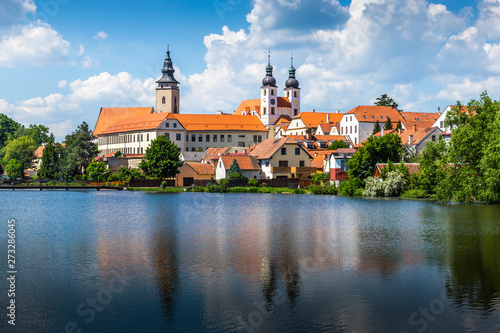 View of Telc across pond with reflections, Unesco world heritage site, South Moravia, Czech Republic.