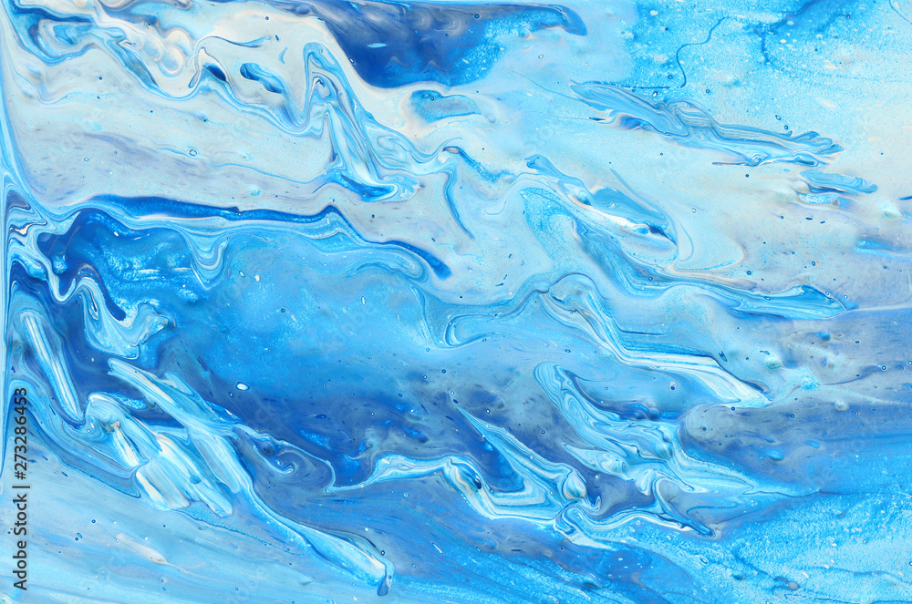 photography of abstract marbleized effect background. Blue, mint and white creative colors. Beautiful paint