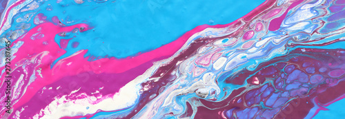 photography of abstract marbleized effect background. Blue  pink  purple and white creative colors. Beautiful paint. banner