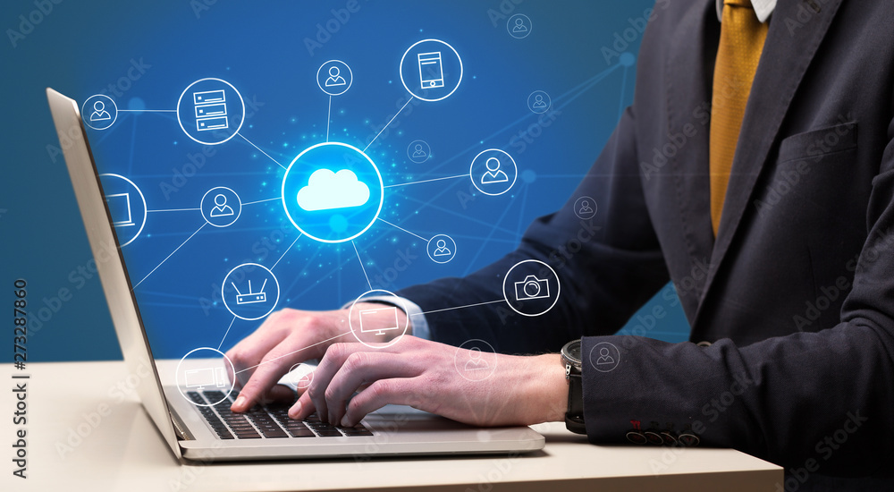 Businessman hand typing with cloud technology system and office symbol concept
Businessman hand typing with cloud technology system and office symbol concept