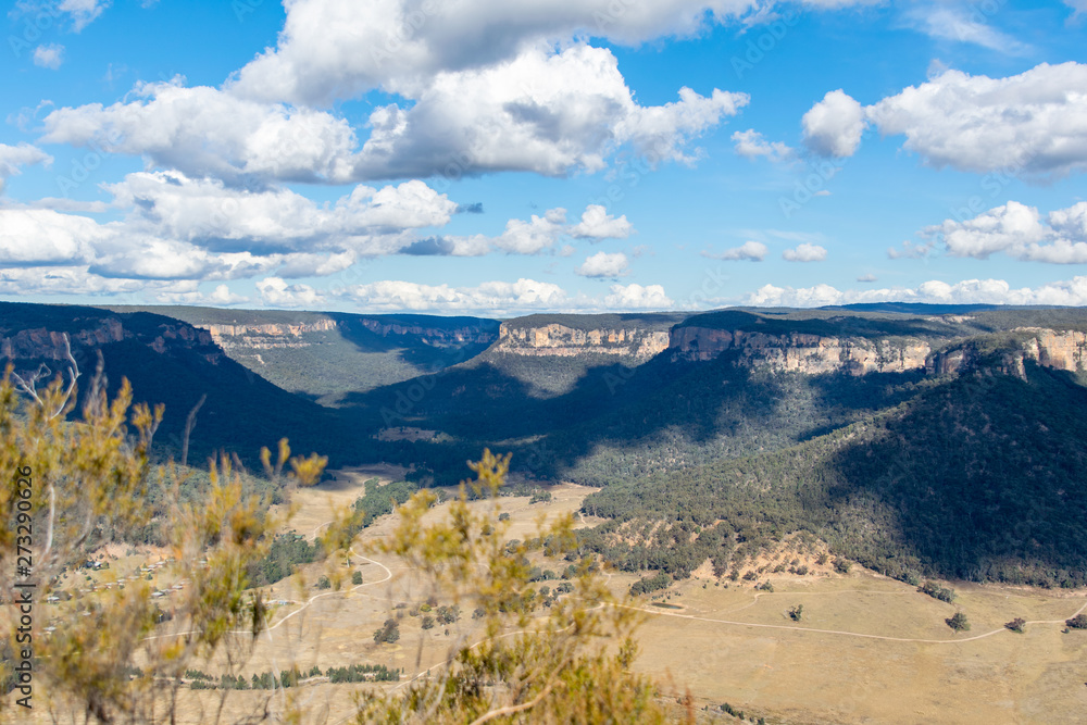 Panoramic view of Wolgan Valley along the Wolgan River in the Lithgow Region of New South Wales, Australia. Part of the Blue Mountains near Sydney. Seen from the summit of Donkey Mountain. Panoramic view of Wolgan Valley along the Wolgan River in the Lithgow Region of New South Wales, Australia. Part of the Blue Mountains near Sydney. Seen from the summit of Donkey Mountain.