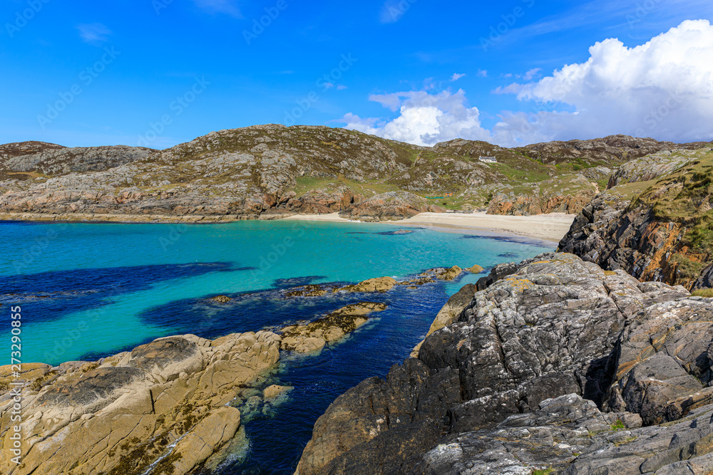 The small hidden beach near Achmelvich beach from the headland between them, Lochinver, Scotland, UK