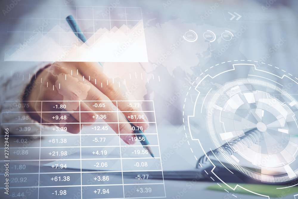 Financial forex graph displayed on hands taking notes background. Concept of research. Double exposure Financial forex graph displayed on hands taking notes background. Concept of research. Double exposure
