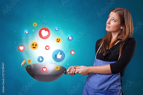 Young happy person cooking social media concept in wok  © ra2 studio