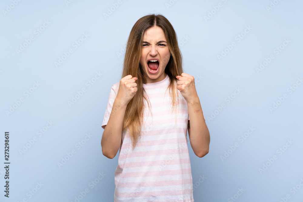 Young woman over isolated blue background frustrated by a bad situation Young woman over isolated blue background frustrated by a bad situation
