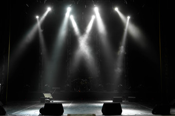 scene, stage light with colored spotlights and smoke