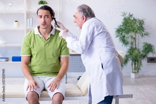 Male patient visiting doctor otolaryngologist © Elnur