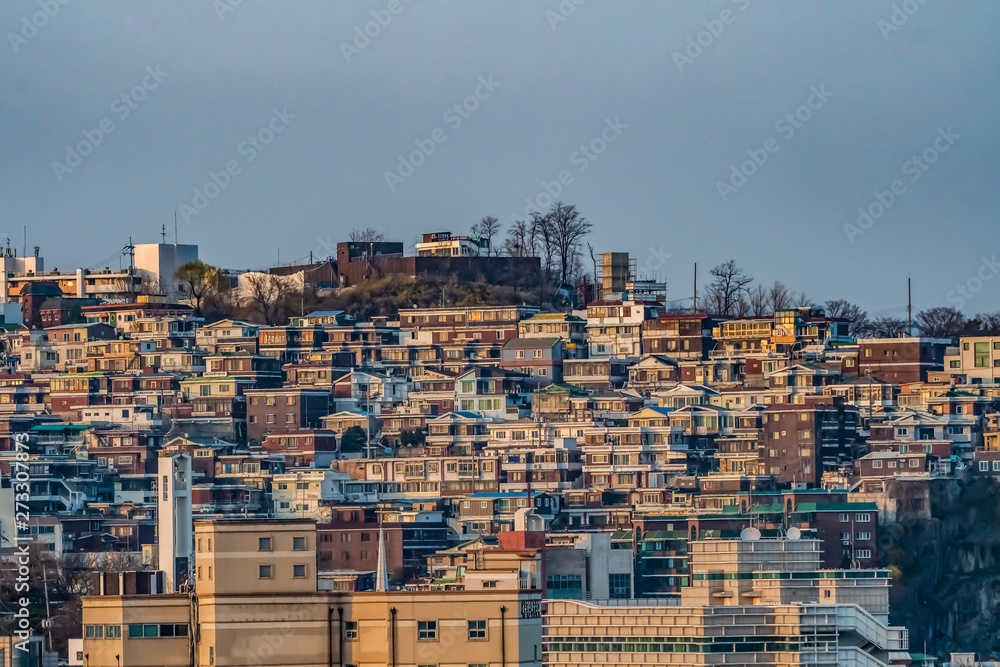 densely packed old houses on a mountain hill in the center of Seoul