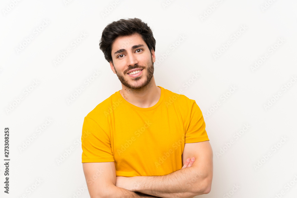 Handsome over isolated white wall laughing Handsome over isolated white wall laughing