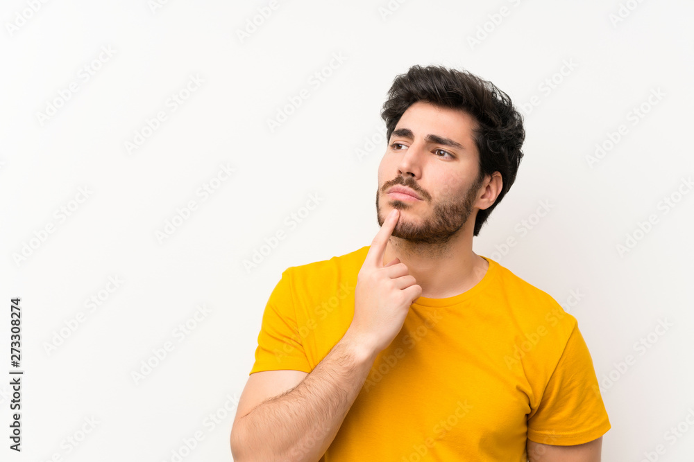 Handsome over isolated white wall thinking an idea Handsome over isolated white wall thinking an idea