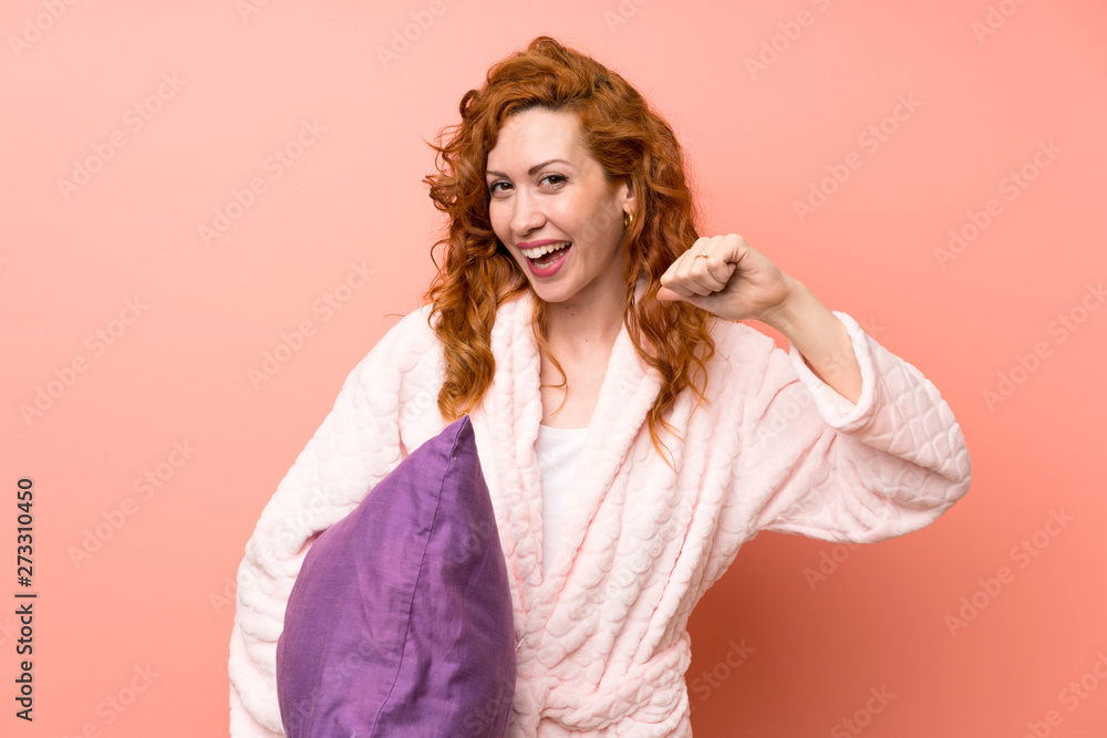 Redhead woman in dressing gown proud and self-satisfied Redhead woman in dressing gown proud and self-satisfied