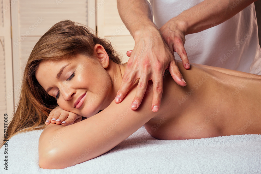 man hands treatment.male having massage in the spa salon for beautiful girl man hands treatment.male having massage in the spa salon for beautiful girl
