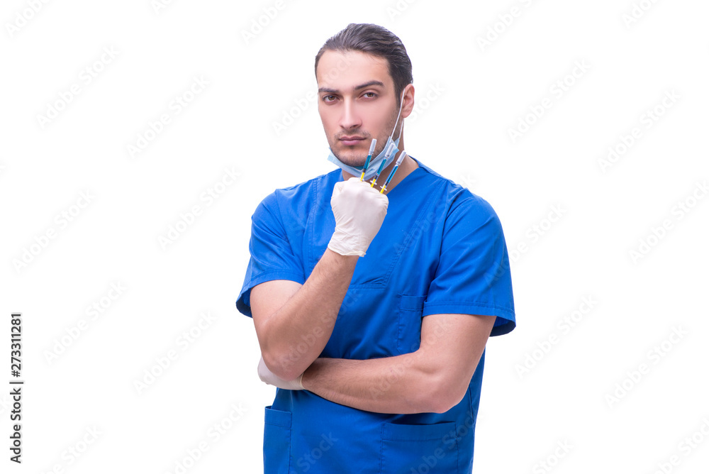 Young handsome doctor with syringe isolated on white Young handsome doctor with syringe isolated on white