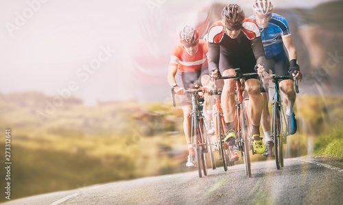 Obraz na płótnie Cyclists out racing along country lanes near the coast in the United Kingdom w salonie