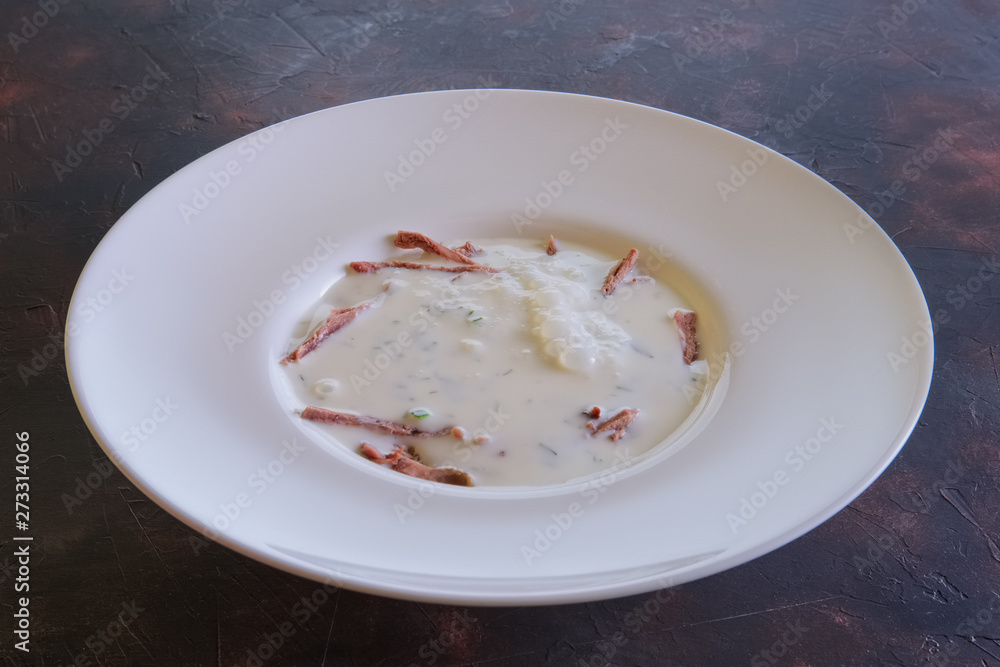 Traditional cold belorussian soup with beef, cucumber, radish and kefir Traditional cold belorussian soup with beef, cucumber, radish and kefir
