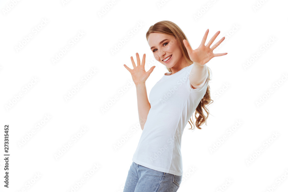 Young woman showing smile, in casual smart clothing, isolated against white background. Caucasian blonde model in emoshions and optimistic, positive, happy feeling concept studio shoot. Young woman showing smile, in casual smart clothing, isolated against white background. Caucasian blonde model in emoshions and optimistic, positive, happy feeling concept studio shoot.