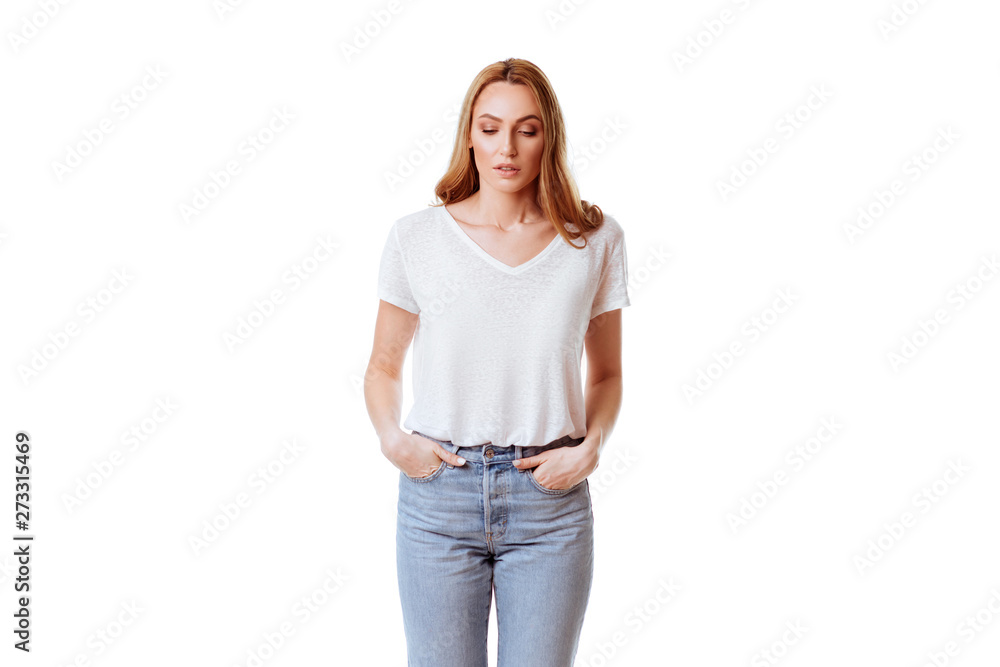 Portrait of a happy woman standing with arms folded isolated on a white background Portrait of a happy woman standing with arms folded isolated on a white background