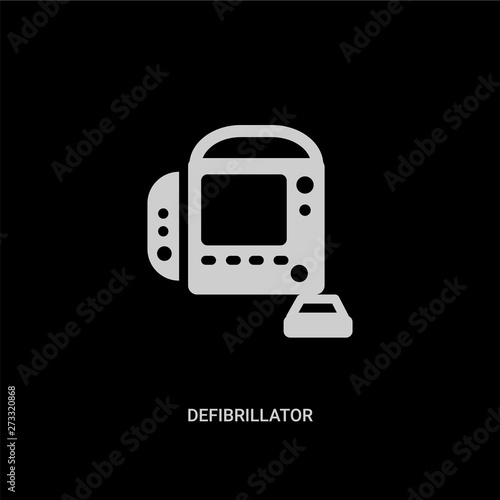 white defibrillator vector icon on black background. modern flat defibrillator from health and medical concept vector sign symbol can be use for web, mobile and logo.