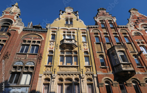 Traditional architecture with vivid facade of tall houses in Ghent.