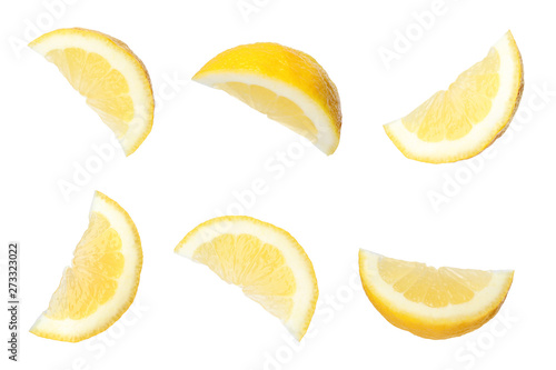 Set of cut fresh juicy lemon on white background