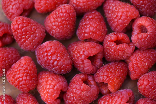 Fresh raspberry texture / Close up red raspberries fruit background