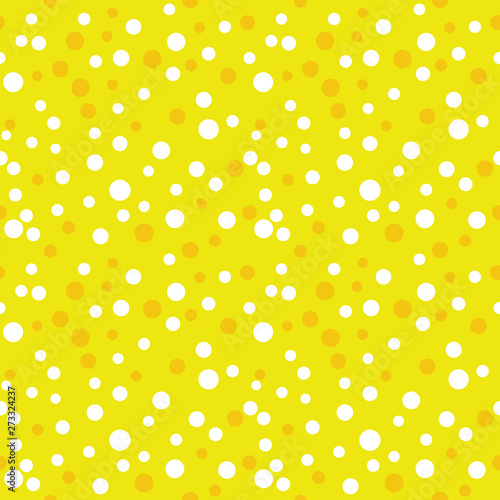 Seamless polka dot pattern. Geometric vector background in yellow. Spot of different sizes placed randomly. Useful for fabric print, interior decorating, home textiles, cloth, wrapping paper, apparel
