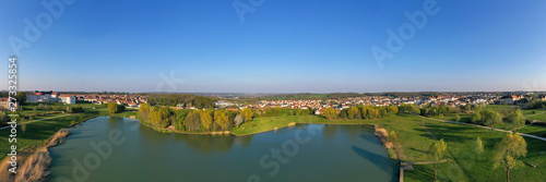 Bild auf Leinwand Panoramic aerial view of Lake Magny-le-Hongre