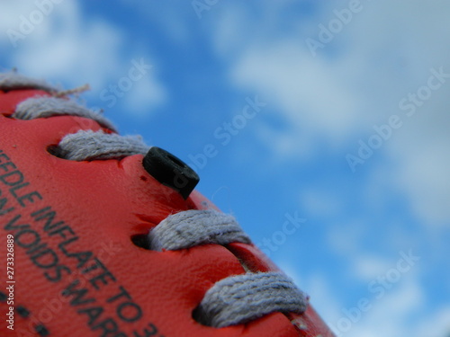 Close up of a football on a sky background