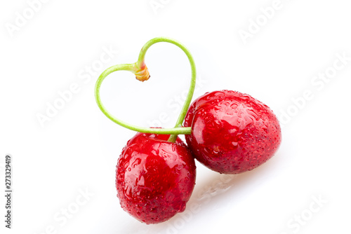 heart shaped cherry on white background