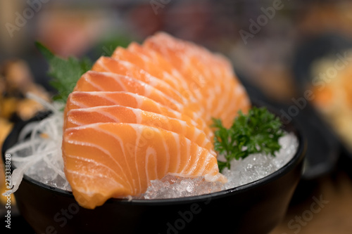 Japanese food sashimi salmon in black bowl