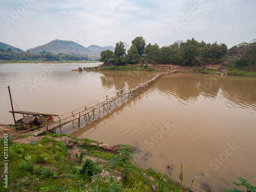 Bamboo bridge on the Mekong Rover, Laos photo